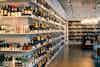 a shelves of liquor on a wall